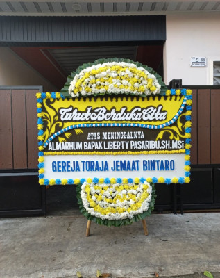 Papan Bunga Duka di Tongowai